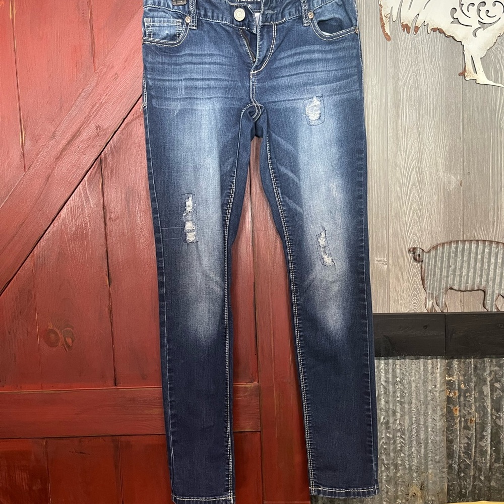 Women's Distressed Blue Jeans
